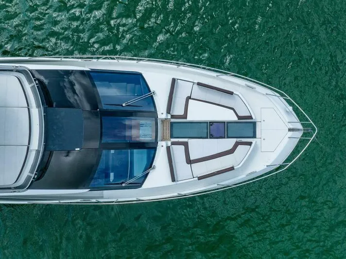  Yacht Photos Pics Aerial view of 2019 Galeon 640 Fly yacht on green water.