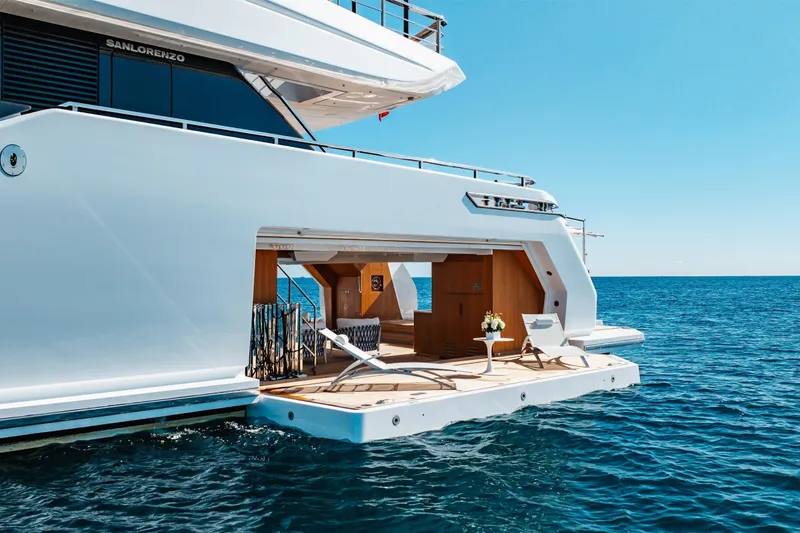 Neverland II Yacht Photos Pics Luxury Sanlorenzo 44 Alloy yacht, 2020 model, with open deck on serene ocean.