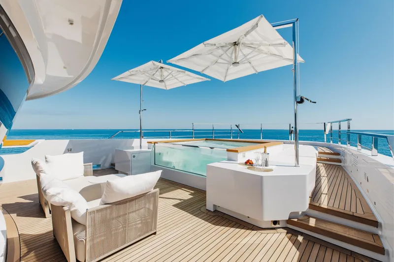 Neverland II Yacht Photos Pics Luxurious deck of 2020 Sanlorenzo 44 Alloy yacht with pool and sun loungers.