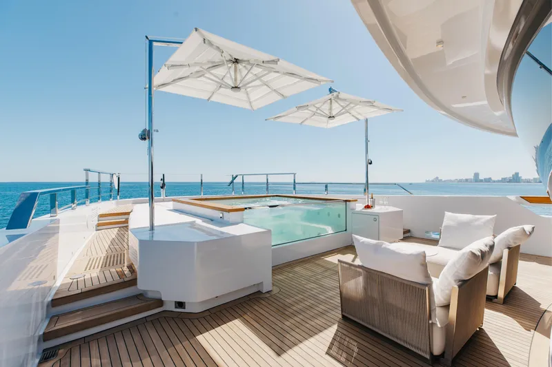 Neverland II Yacht Photos Pics Luxurious 2020 Sanlorenzo 44 Alloy yacht deck with pool and seating area.
