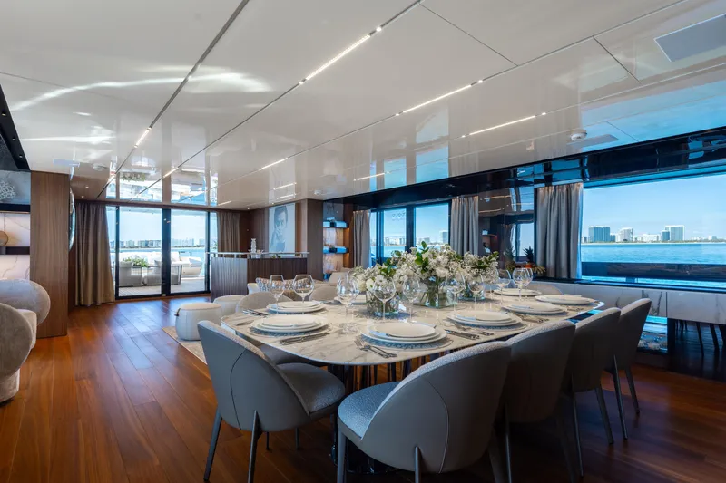 Neverland II Yacht Photos Pics Luxurious dining area on 2020 Sanlorenzo 44 Alloy yacht with elegant table setting.