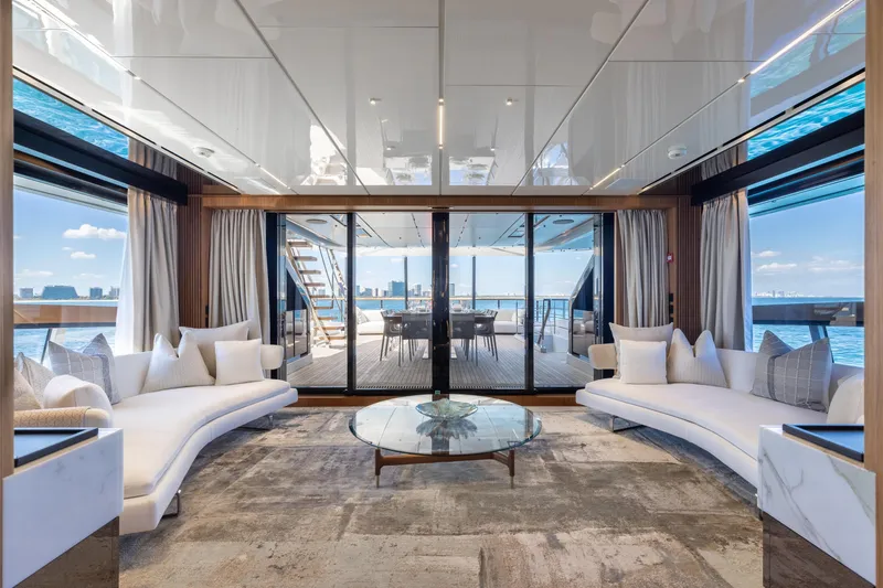 Neverland II Yacht Photos Pics Luxurious interior of 2020 Sanlorenzo 44 Alloy yacht with elegant seating and ocean view.