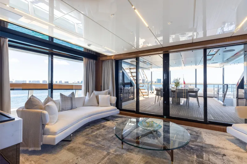 Neverland II Yacht Photos Pics Luxurious interior of 2020 Sanlorenzo 44 Alloy yacht with elegant seating and ocean view.