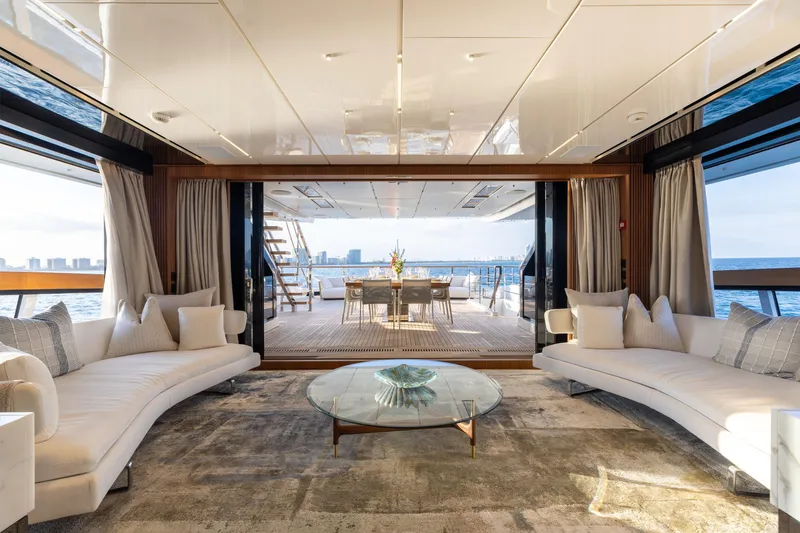 Neverland II Yacht Photos Pics Luxurious interior of 2020 Sanlorenzo 44 Alloy yacht with elegant seating and ocean view.