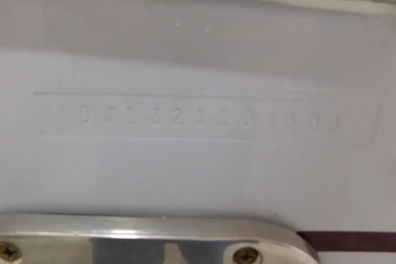  Yacht Photos Pics 2003 Regulator 32 Center Console hull identification number close-up.