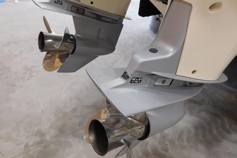  Yacht Photos Pics Propellers of a 2003 Regulator 32 Center Console boat, showcasing dual outboard motors.