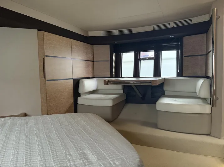  Yacht Photos Pics Luxurious interior of a 2016 Azimut 54 yacht with modern seating and table.