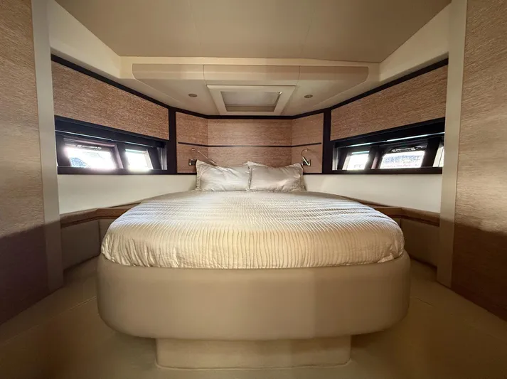  Yacht Photos Pics Luxurious bedroom interior of 2016 Azimut 54 yacht with elegant bedding and modern design.