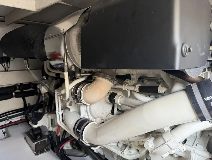  Yacht Photos Pics Engine compartment of a 2016 Azimut 54 yacht, showcasing detailed mechanical components.