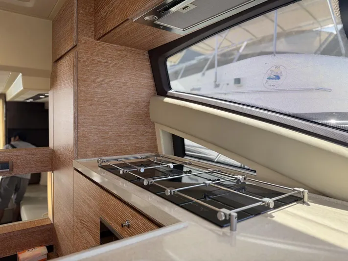  Yacht Photos Pics Interior of 2016 Azimut 54 yacht featuring a modern kitchen area.