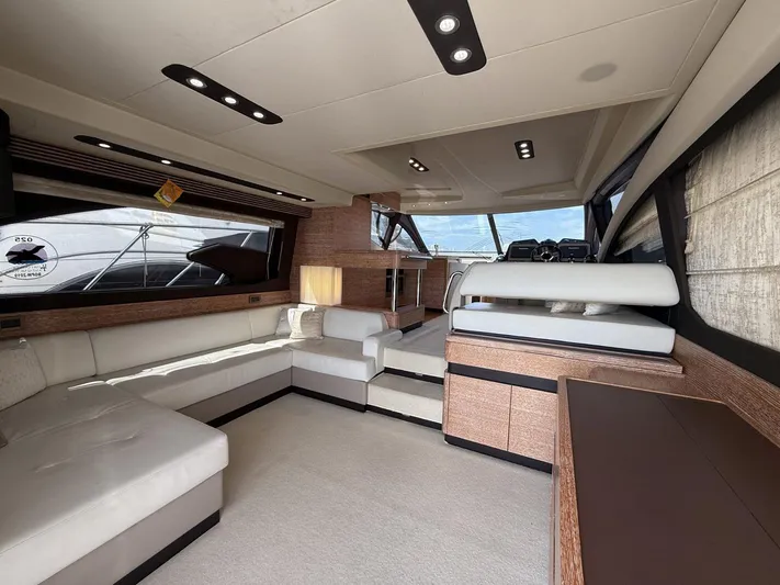  Yacht Photos Pics Luxurious interior of a 2016 Azimut 54 yacht with modern furnishings and ample natural light.