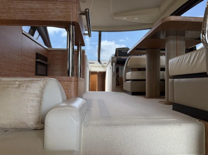  Yacht Photos Pics Interior of a 2016 Azimut 54 yacht, featuring luxurious seating and modern design.