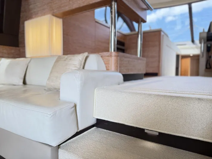  Yacht Photos Pics Luxurious interior of 2016 Azimut 54 yacht with elegant white seating.