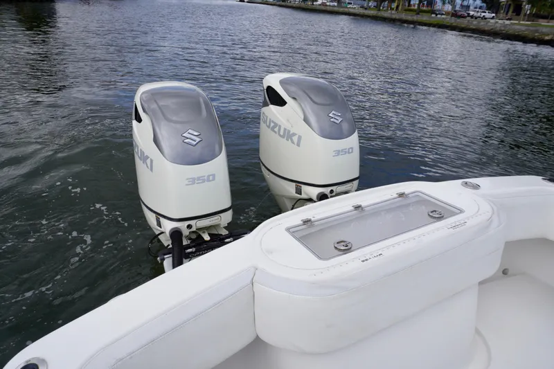  Yacht Photos Pics 2019 Dusky 33 boat with twin Suzuki 350 outboard engines on water.