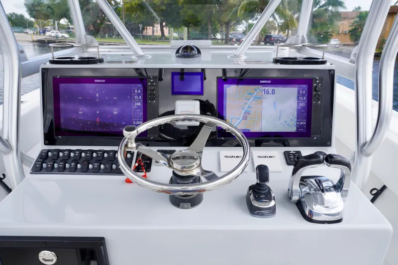  Yacht Photos Pics Control panel of a 2019 Dusky 33 boat with dual Simrad displays.