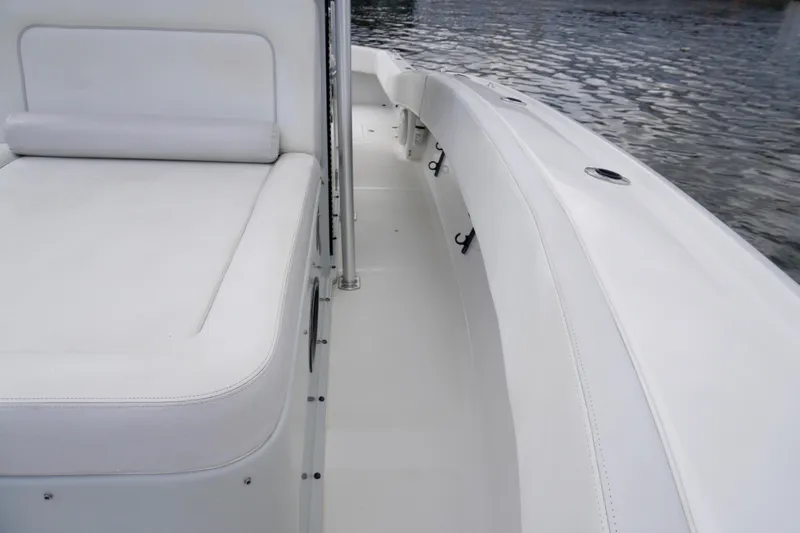  Yacht Photos Pics 2019 Dusky 33 boat interior with white seating and water view.