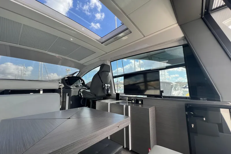 Rivo Co Rivo Yacht Photos Pics Luxurious interior of 2019 Pershing 5x yacht with modern design and panoramic windows.