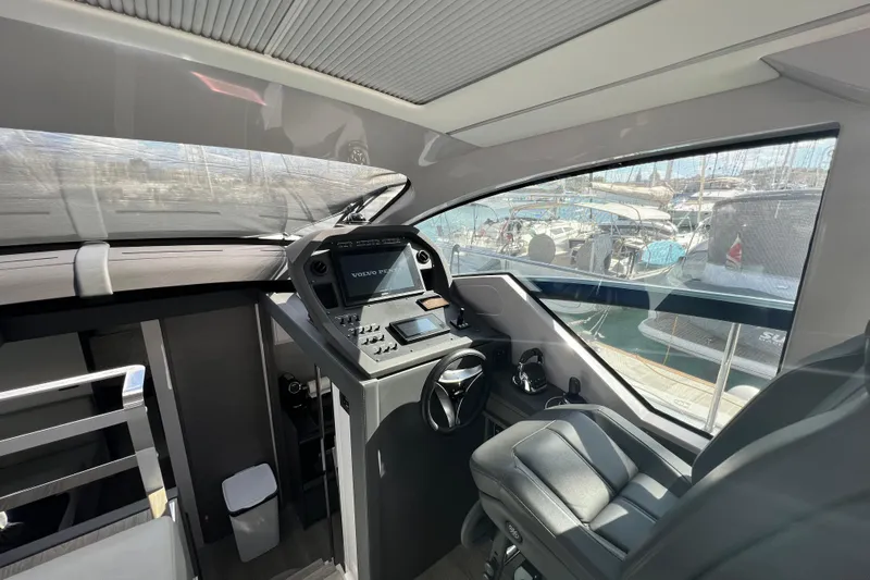 Rivo Co Rivo Yacht Photos Pics Interior cockpit of 2019 Pershing 5x yacht with modern controls and leather seating.