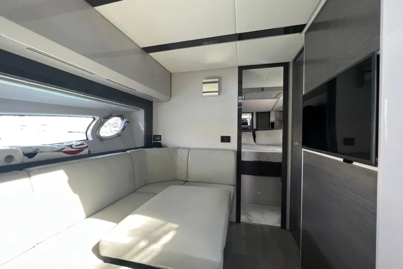 Rivo Co Rivo Yacht Photos Pics Luxurious interior of 2019 Pershing 5x yacht with modern seating and sleek design.