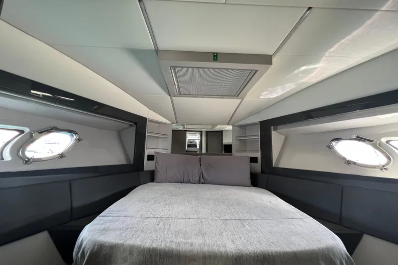 Rivo Co Rivo Yacht Photos Pics Luxurious interior cabin of 2019 Pershing 5x yacht with modern design and comfortable bedding.