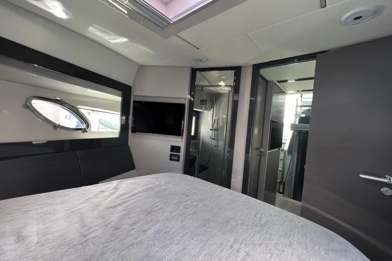 Rivo Co Rivo Yacht Photos Pics Luxurious interior of 2019 Pershing 5x yacht with modern amenities and sleek design.