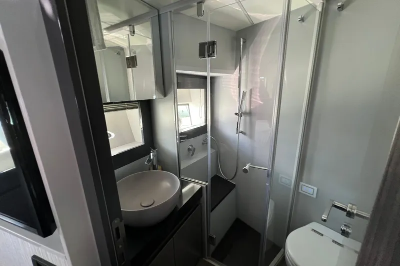 Rivo Co Rivo Yacht Photos Pics Luxurious bathroom in 2019 Pershing 5x yacht with modern fixtures and sleek design.