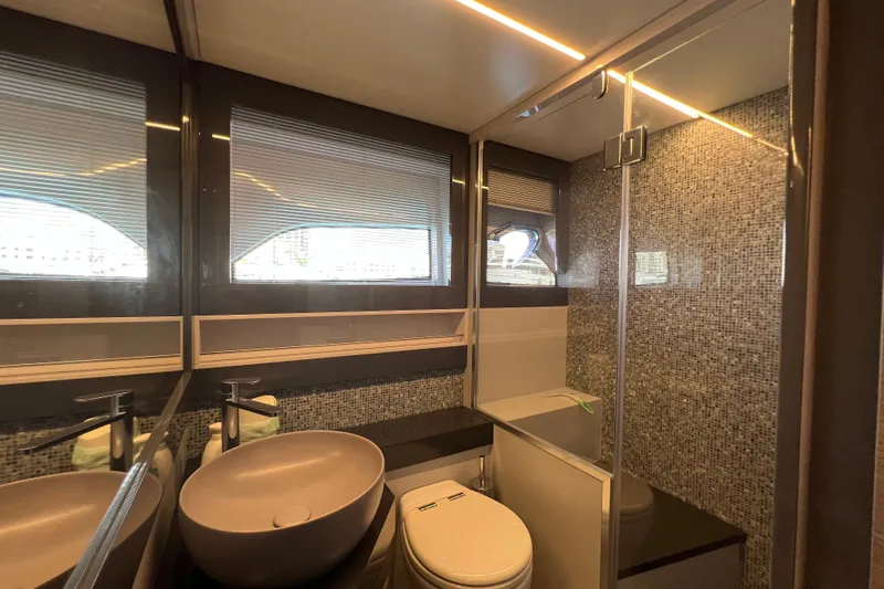 Rivo Co Rivo Yacht Photos Pics Luxurious bathroom in 2019 Pershing 5x yacht with modern fixtures and mosaic tiles.