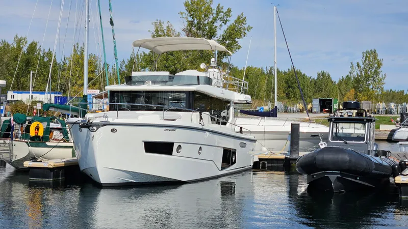  Yacht Photos Pics 2021 Cranchi Eco Trawler T43 Long Distance docked at a marina.