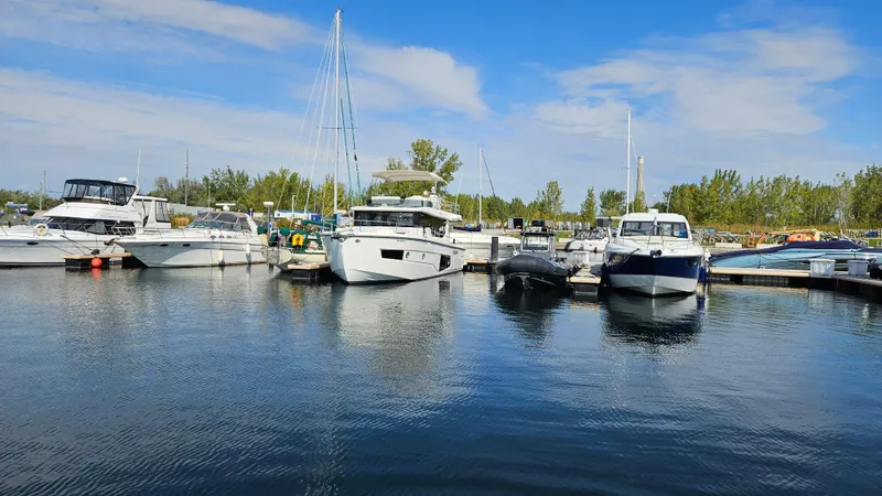  Yacht Photos Pics Boats docked at a marina, featuring a 2021 Cranchi Eco Trawler T43 Long Distance.