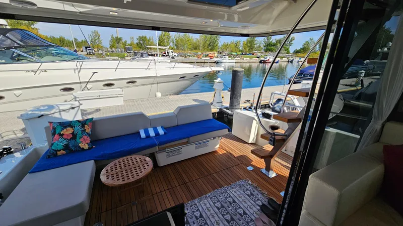  Yacht Photos Pics 2021 Cranchi Eco Trawler T43 Long Distance yacht with spacious deck and seating area.