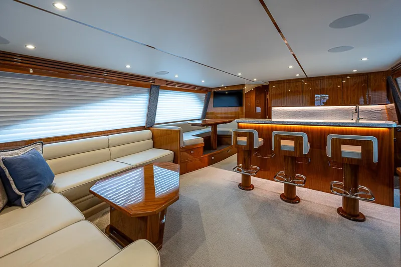 City Hands Yacht Photos Pics Luxurious interior of a 2020 Viking 68 Convertible yacht with modern furnishings.