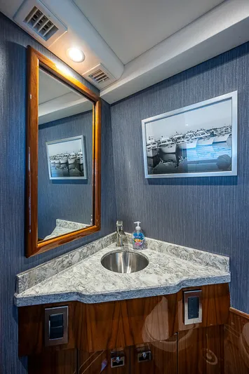 City Hands Yacht Photos Pics 2020 Viking 68 Convertible yacht bathroom with modern sink and mirror.