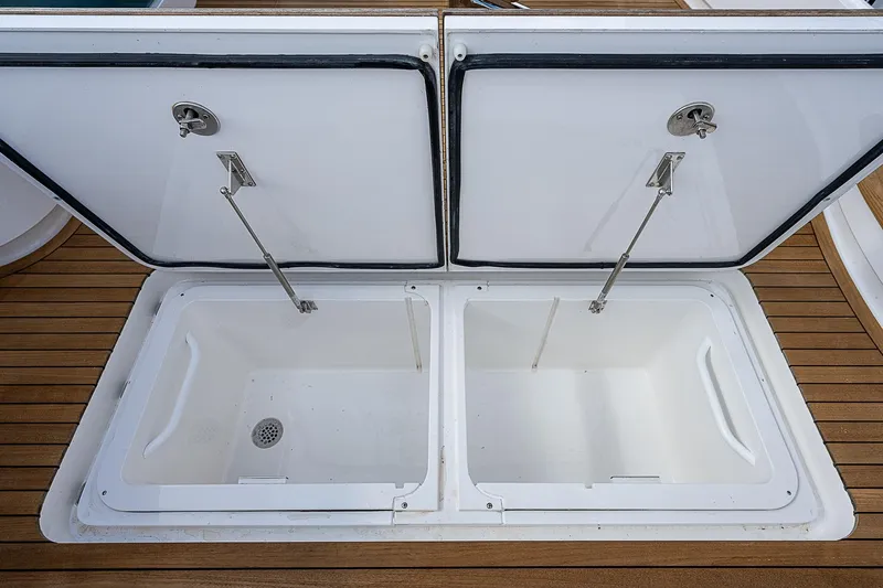 City Hands Yacht Photos Pics Open storage compartments on 2020 Viking 68 Convertible yacht.