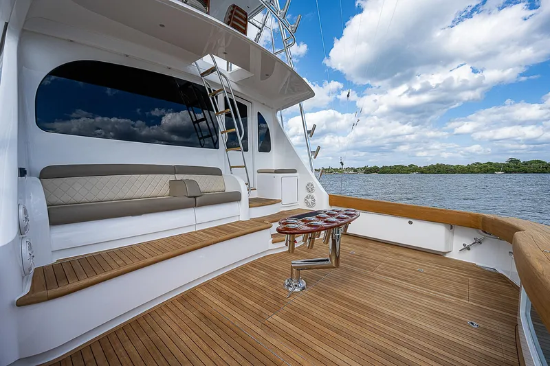 City Hands Yacht Photos Pics 2020 Viking 68 Convertible yacht with spacious deck and scenic water view.