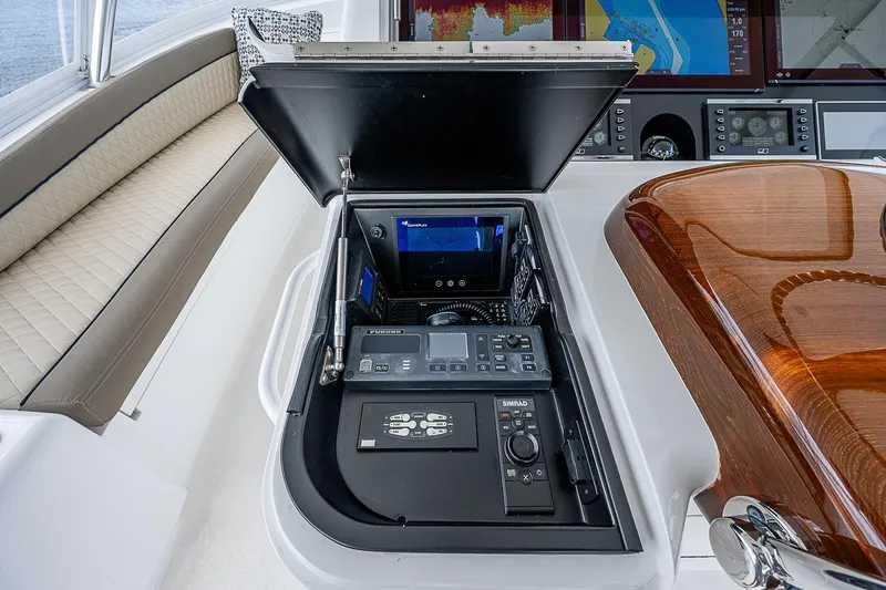 City Hands Yacht Photos Pics Control panel of a 2020 Viking 68 Convertible yacht with navigation equipment.