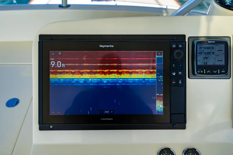 Three Aces Yacht Photos Pics Sonar display on 2007 Hinckley Talaria 55 FB showing depth of 9 feet.
