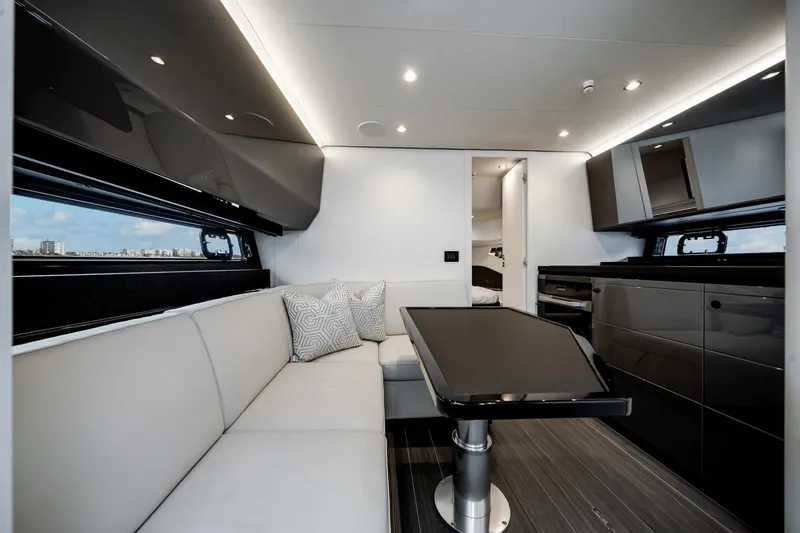  Yacht Photos Pics Luxurious interior of 2025 Azimut Verve 48 yacht with modern seating and sleek design.