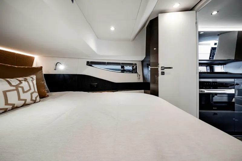  Yacht Photos Pics Luxurious interior of 2025 Azimut Verve 48 yacht cabin with modern design.