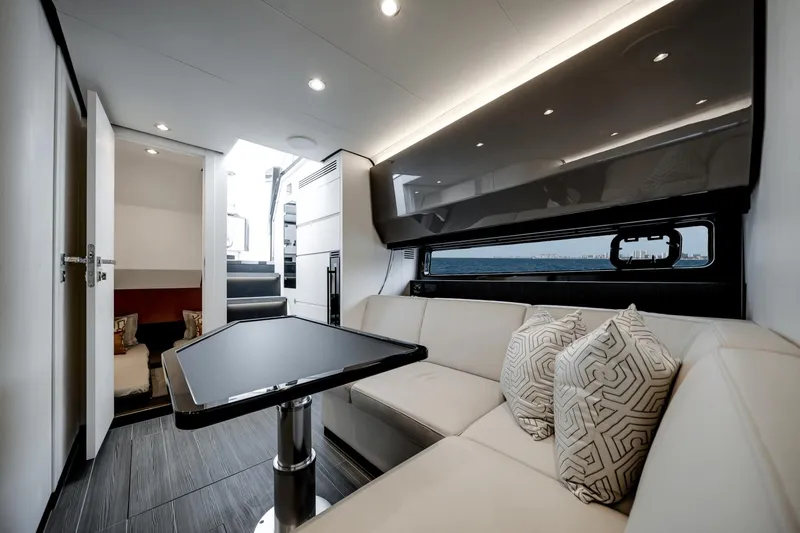  Yacht Photos Pics Luxurious interior of 2025 Azimut Verve 48 yacht with modern seating and elegant design.