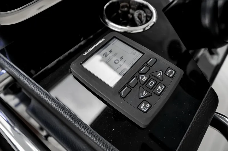  Yacht Photos Pics Control panel on 2025 Azimut Verve 48 yacht dashboard, featuring navigation display and buttons.