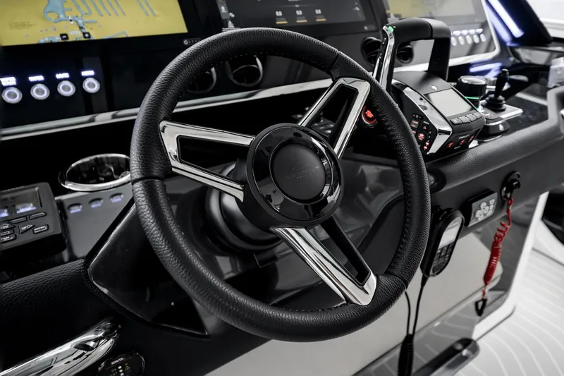  Yacht Photos Pics Steering wheel and controls of 2025 Azimut Verve 48 yacht cockpit.