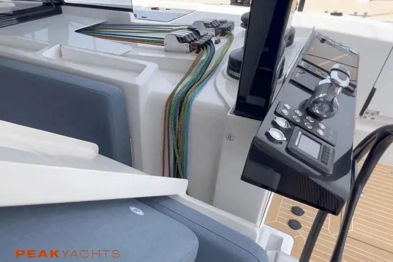 Hoku'au Yacht Photos Pics 2025 HH Catamarans HH44 yacht cockpit with control panel and colorful ropes.