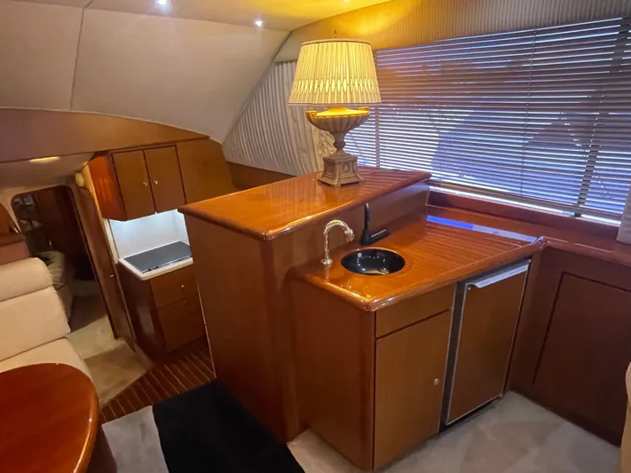 Escape Yacht Photos Pics Interior of 1998 Ocean Yachts 53 Super Sport with elegant wood finish.