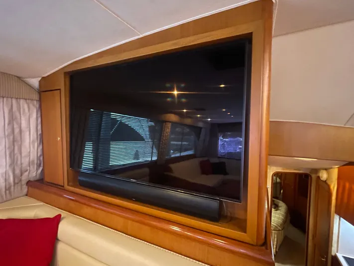 Escape Yacht Photos Pics Interior of a 1998 Ocean Yachts 53 Super Sport with television.