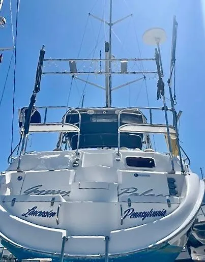 Gypsy Palace Yacht Photos Pics 2003 Hunter Passage 420 sailboat docked under clear blue sky.