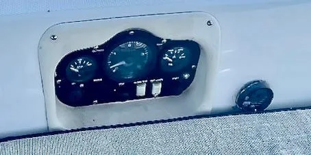 Gypsy Palace Yacht Photos Pics Control panel of 2003 Hunter Passage 420 sailboat with gauges and switches.