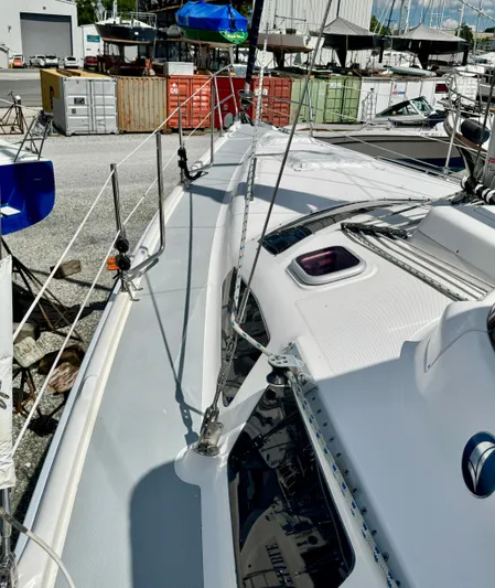 Gypsy Palace Yacht Photos Pics 2003 Hunter Passage 420 sailboat deck view in a marina setting.