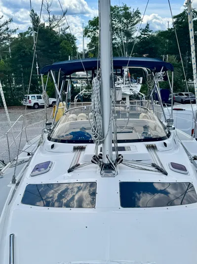 Gypsy Palace Yacht Photos Pics 2003 Hunter Passage 420 sailboat docked, featuring sleek design and spacious deck.