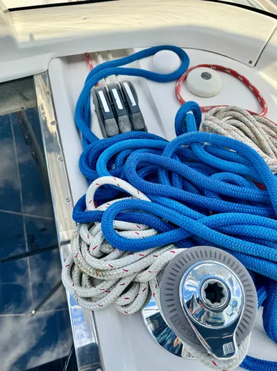Gypsy Palace Yacht Photos Pics Coiled ropes and winch on 2003 Hunter Passage 420 sailboat deck.