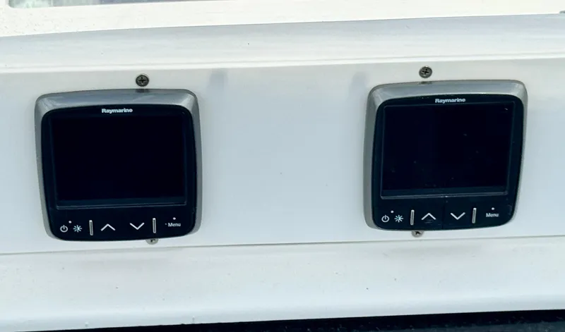 Gypsy Palace Yacht Photos Pics Dual Raymarine displays on a 2003 Hunter Passage 420 yacht dashboard.